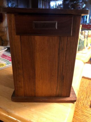 Antique Hardwood Disappearing Coin Bank With Ornate Star Details On Both Sides 2