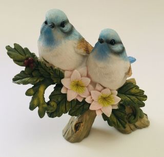 Vintage Polyresin Ornament Of A Blue Birds On A Branch With Flowers