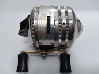 Vintage Zebco Gold Crown 909 Spin Cast Fishing Reel,  Chrome,  Black,  And Brass