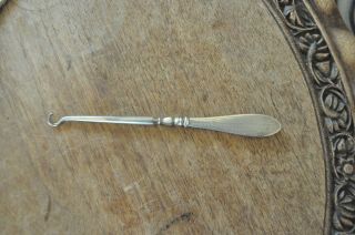 Antique Broadway & Co Silver Button Hook with pattern on the handle 3