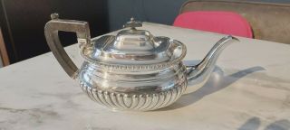 An Antique Silver Plated Tea Pot By J.  Dixon & Sons.  Sheffield.  Circa 1879.