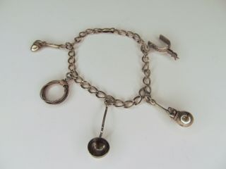 Antique Sterling Charm Bracelet,  Western Theme: Rope,  Axe,  Stirrup,  Ladle,  More