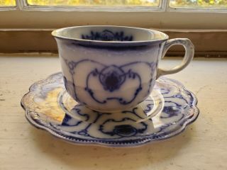Antique W.  H.  Grindley England.  Flow Blue China Teacup And Saucer Scalloped Edge