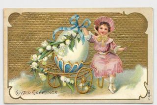 Antique Postcard Easter Girl Pink Dress Egg On Cart Lilly Of The Valley Gold Emb
