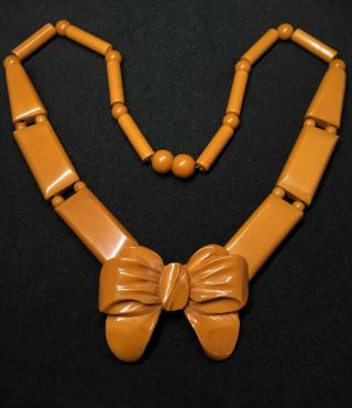 Rare Vintage Art Deco Butterscotch Bakelite Carved Bow Bead Necklace -