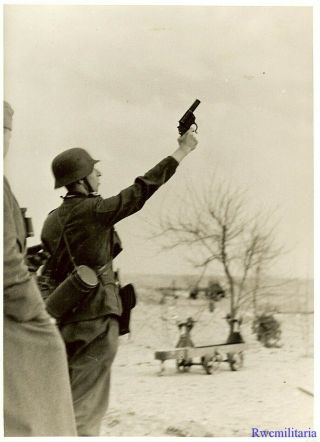 Press Photo: Rare Wehrmacht Soldier Firing Signal Pistol; Agde,  France 1944
