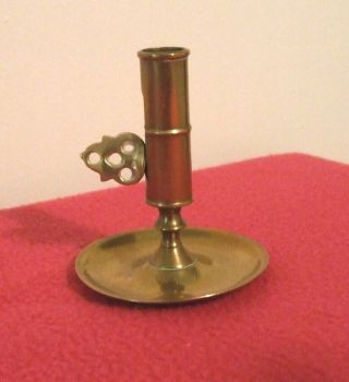 Small Vintage Brass Candle Holder With Push Up Facility.