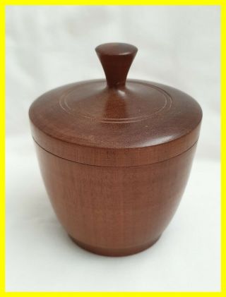 A Turned Walnut Wooden Jar With Lid