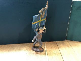 Elastolin: A Very Rare 10cm Swedish Flag Bearer With Sword.  Pre War C1914