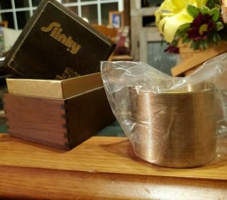 RARE - SLINKY 50th ANNIVERSARY 1945 - 95 Gold plated with wooden box. 2