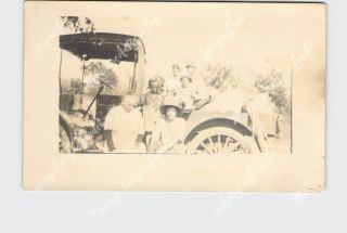 Rppc Real Photo Postcard Women And Children Sit On Bed Of Antique Truck Hats Bon