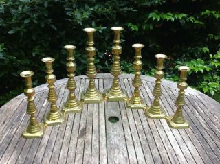 Rare Set Of Four Graduated Pairs Of Victorian Beehive Pattern Brass Candlesticks