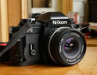 Rare Black Nikon FG 35mm film SLR camera w/ Nikon 28mm F2.  8 Lens & Case & Book 2