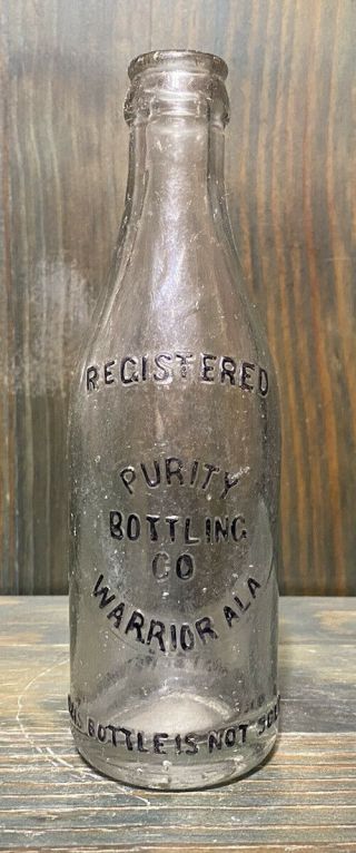 Rare Purity Bottling Co Circle Slug Soda Bottle Warrior Alabama Early Ala