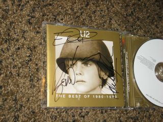 Rare U2 band signed the Best of 1980 - 90 autographed cd 2