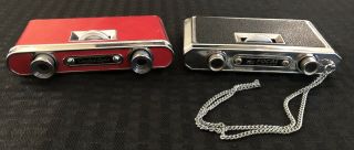 2 Pairs Vintage Folding Opera Glasses/binoculars.  Black Focal And Red Satellite.