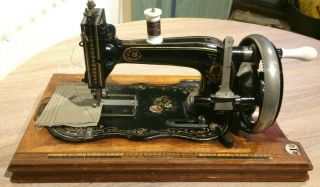 Antique Avenue Handcrank Sewing Machine By Gustav Winselmann.