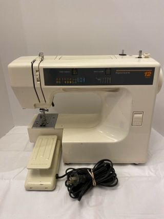 Kenmore 12 Stitch Sewing Machine Model 385.  1278180 With Pedal