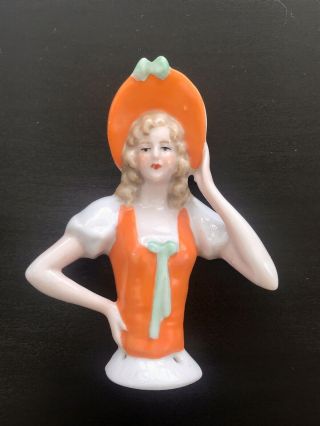 Art Deco German Porcelain Pin Cushion Half Doll With Orange Lined Bonnet & Dress