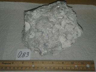 Large specimen phenakite on quartz/feldspar matrix,  Mt.  Antero,  Colorado Q83 2