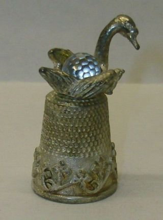 A Pewter Thimble Set With A Large Crystel Of A Caricature Of A - - Swan - -