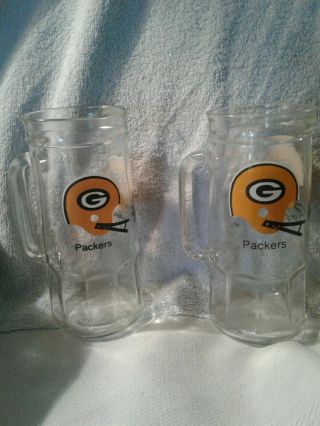 Two Vintage Nfl Green Bay Packers Glass Fisher Nut Jar Beer Mug.