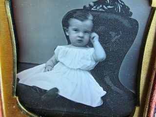 Young Child Sitting On A Chair With Colored In Dress Daguerreotype Photograph