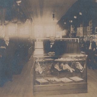 C1910 Webster City Iowa Clothing Store Interior Card Photograph Gloves Shirts