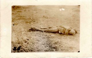 World War I Real Photo Post Card: Dead Soldier - Corpse In A Field