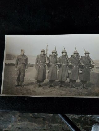 An Old Photograph Of A Group Of Ww1 Soldiers
