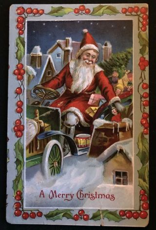 Santa Claus In Old Car With Toys & Holly Antique Christmas Postcard H35