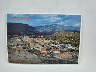 Vintage Durango Colorado Postcard Aerial City View Train Depot Clouds Mountains