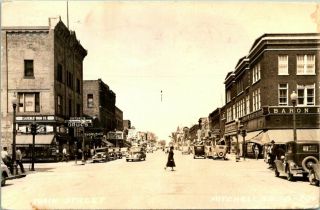 Vintage Rppc Postcard Mitchell South Dakota " Main Street " Saterlie Drugs 1943