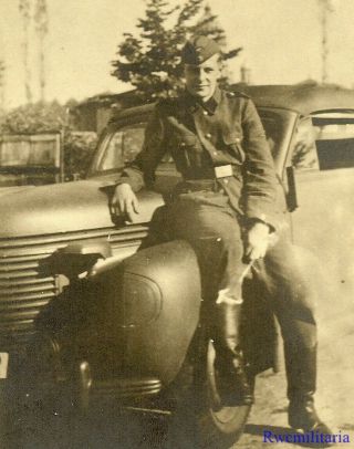 Port.  Photo: Rare German Elite Waffen Soldier Posed On Opel Kapitän Staff Car