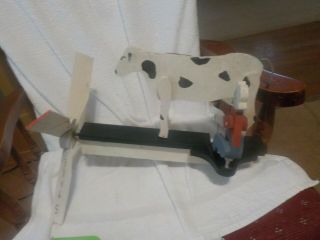 Vintage Wooden Whirley Gig Man Milking Cow
