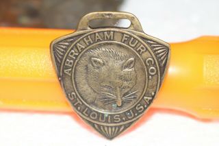 Antique Vintage Abraham Fur Co.  Hunting Trapping Watch Fob Sign