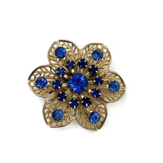 Vtg Gold Tone Open Work Metal Filigree Flower Blue Rhinestone Brooch Pin