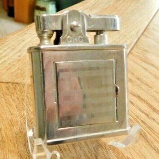 VINTAGE CONTINENTAL CMC LIGHTER,  WITH FRONT COMPARTMENT.  PHOTO,  COMPACT. 2