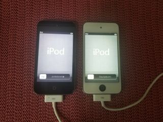 2 Vintage Apple Ipods,  One 8gb And The Other 32gb Including Two Charging Cords