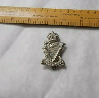 Vintage Army Cap Badge The Royal Irish Regiment.  " Who Shall Separate Us " Vgc
