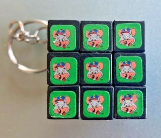 Vintage 1980 ' s Pizza Time Theater Chuck E Cheese Rubik ' s Cube Keychain Solved 3