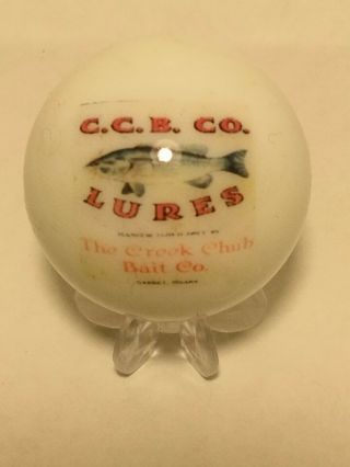 Creek Chub Bait Company Vintage Ad On White Shooter Marble With Stand