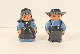 Vintage Cast Iron Amish Salt And Pepper Shakers Man And Woman Blue And Black