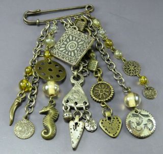 Vintage Mixed Metals Safety Pin Brooch Dangles Seahorse Tusk Coin Medallions