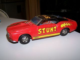 Vintage T.  P.  S.  Battery Operated Tin Ford Mustang Mach 1 Stunt Car - Made In Japan