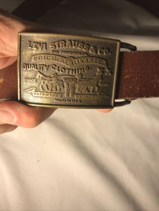 Vintage Levi Strauss belt buckle and brown leather belt size 30 2