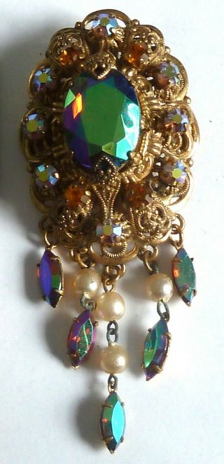 A Vintage 1950s Gold Tone Czech Brooch With Blue Carnival Glass Stones