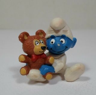 Peyo Schleich Vtg 1984 Smurfs 1.  5  20205 Baby Smurf With Teddie Bear Pvc Figure