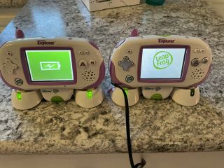 2 Leapster Explorer Systems,  7 Games,  Cases And Recharging Batteries