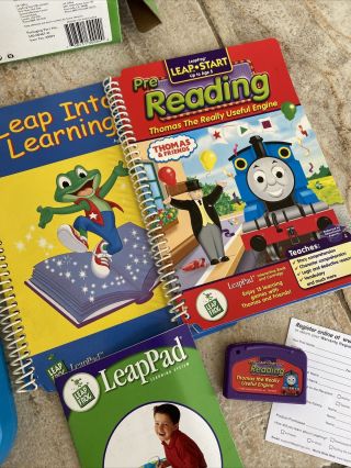 LeapFrog LeapPad learning system,  2 books and 1 cartridge Thomas.  VGC 3